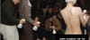 Nude models squirting yogurt as ad event fined for obscenity.