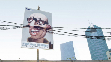 Billboards built around actual electric wires and poles to amusingly yet convincingly dramatize the 